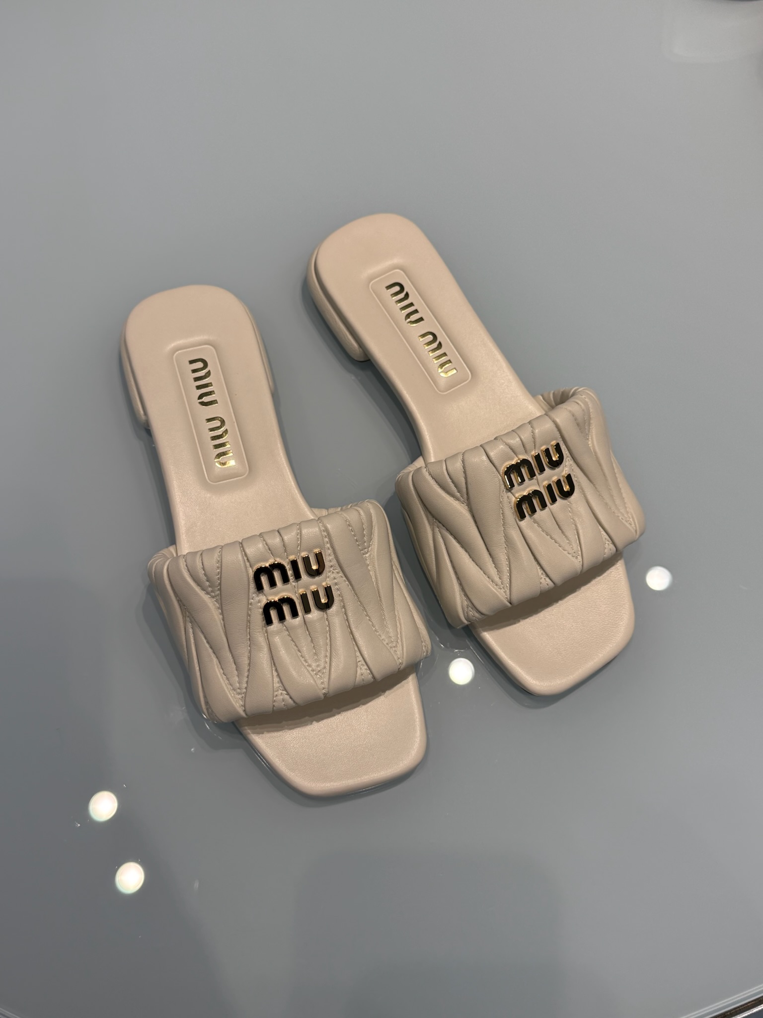 Matelassé Slides Miu Miu